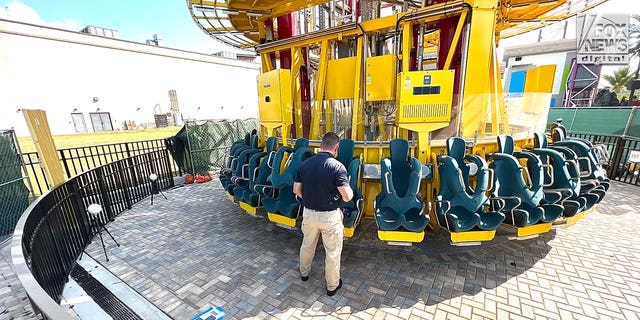 Representatives Austrian ride manufacturer, Funtime Handels inspect the Freefall drop tower ride at Icon Park in Orlando Florida, Thursday, February, 23, 2023. Ride goer, Tyree Sampson died when he fell from the ride in March last year. 