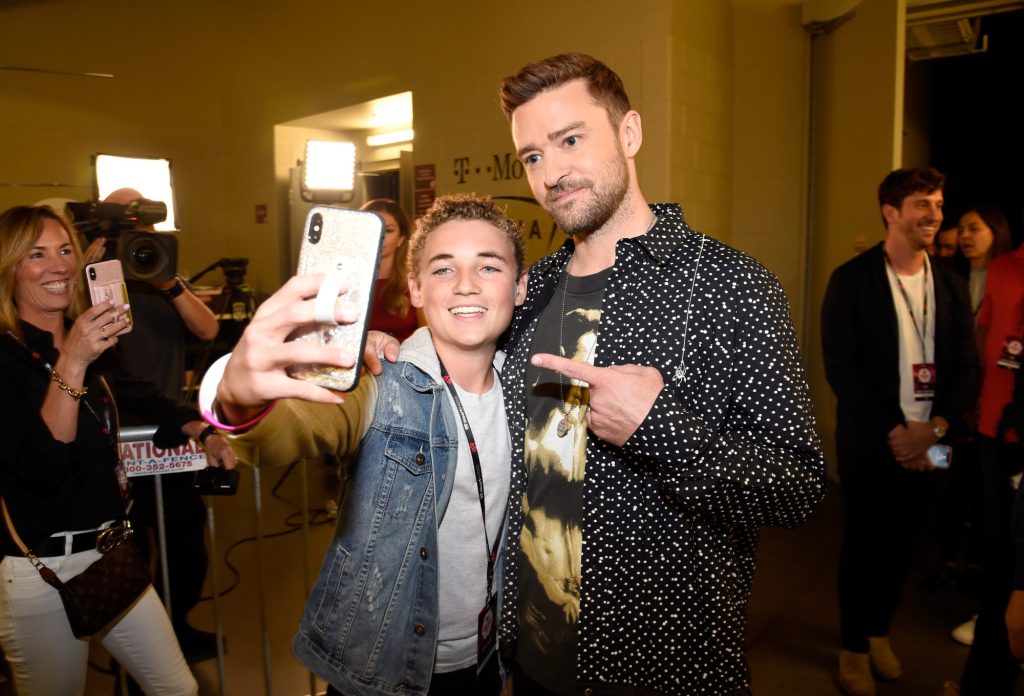 Ryan McKenna aka 'Selfie Kid' (L) and Justin Timberlake attend the 2018 iHeartRadio Music Festival on Sept. 22 in Las Vegas.