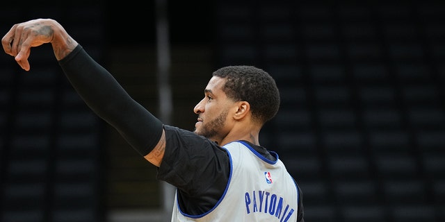 Gary Payton II of the Golden State Warriors shoots during a 2022 NBA Finals practice and media availability June 7, 2022, at the TD Garden in Boston.