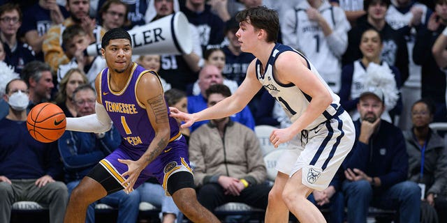 Tennessee Tech Golden Eagles guard Diante Wood (1) backs into the lane against Butler Bulldogs guard Simas Lukosius (41) during the men's college basketball game between the Butler Bulldogs and Tennessee Tech Golden Eagles on December 3, 2022, at Hinkle Fieldhouse in Indianapolis, IN. 