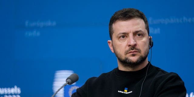 Ukrainian President Volodymyr Zelenskyy talks to media during a press conference following the European Union leaders' summit on in Brussels on Thursday.