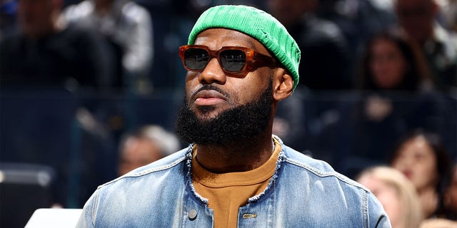 LeBron James of the Los Angeles Lakers looks on from the bench during the Golden State Warriors  game on Feb. 11, 2023, at Chase Center in San Francisco.