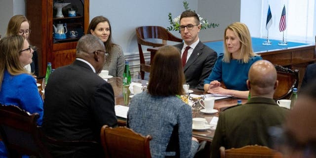 Secretary of Defense Lloyd Austin (2ndL) and Estonia's Prime Minister Kaja Kallas (R, back) hold bilateral talks in Tallinn, Estonia, on Feb. 16, 2023. 