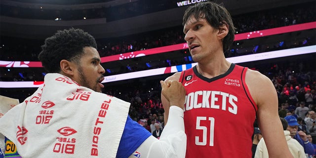 Boban Marjanović (51) of the Houston Rockets and Tobias Harris (12) of the Philadelphia 76ers after a game Feb. 13, 2023, at the Wells Fargo Center in Philadelphia. 