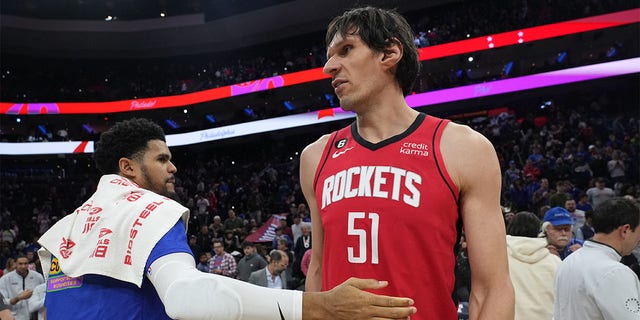 Boban Marjanović (51) of the Houston Rockets and Tobias Harris (12) of the Philadelphia 76ers after a game Feb. 13, 2023, at the Wells Fargo Center in Philadelphia 