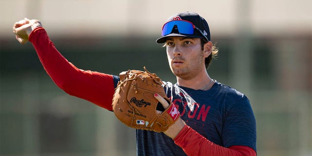 Triston Casas, #36 of the Boston Red Sox, throws during a Boston Red Sox spring training workout on February 22, 2023, at jetBlue Park at Fenway South in Fort Myers, Florida.