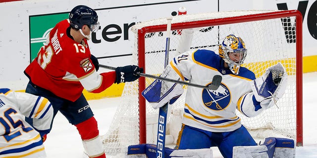 Goaltender Craig Anderson, #41 of the Buffalo Sabres, makes a save against Sam Reinhart, #13 of the Florida Panthers, at the FLA Live Arena on February 24, 2023, in Sunrise, Florida. 