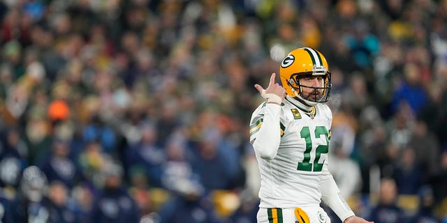 Aaron Rodgers #12 of the Green Bay Packers reacts after a play against the Tennessee Titans during the first quarter in the game at Lambeau Field on November 17, 2022 in Green Bay, Wisconsin. 