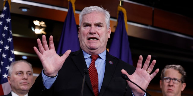 Flanked by House Majority Leader Steve Scalise, R-LA, and Rep. Adrian Smith, R-NE, House Majority Whip Tom Emmer, R-Minn., talks to reporters during a news conference following a GOP caucus meeting at the U.S. Capitol on January 10, 2023 in Washington, DC. 