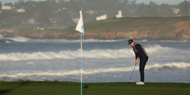 Justin Rose reacts to his putt on the 10th green during the Pebble Beach Pro-Am on Feb. 6, 2023.