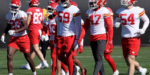 Joshua Williams #23, Nazeeh Johnson #13, Joshua Kaindoh #59, Darius Harris #47 and Leo Chenal #54 of the Kansas City Chiefs participate in a practice session prior to Super Bowl LVII at Arizona State University Practice Facility on February 10, 2023, in Tempe, Arizona. =