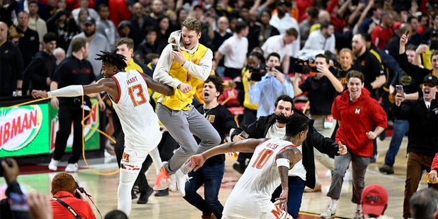 Hakim Hart and Julian Reese of the Maryland Terrapins after a 68-54 victory against the Purdue Boilermakers on Feb. 16, 2023, in College Park, Maryland.