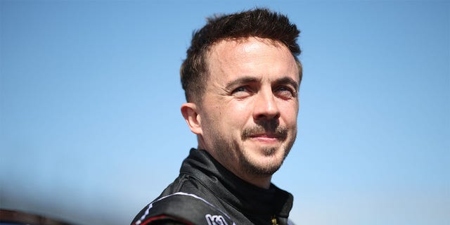 Frankie Muniz, driver of the #30 Hair Club Ford, waits on the grid prior to the ARCA Menards Series BRANDT 200 Supporting Florida FFA at Daytona International Speedway on February 18, 2023 in Daytona Beach, Florida. 