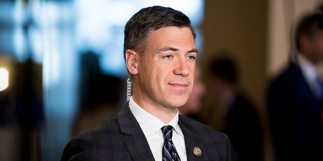 Rep. Jim Banks, R-Ind., does a television interview in the Capitol on Wednesday, Sept. 27, 2017.