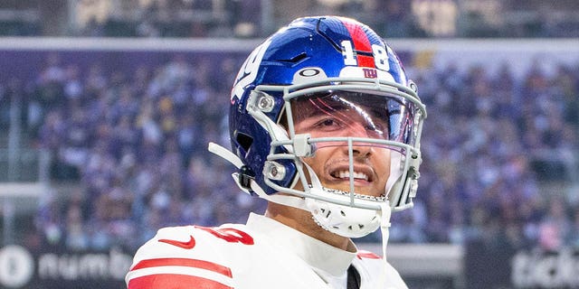 New York Giants wide receiver Isaiah Hodgins (18) looks on after a touchdown during the NFL game between the New York Giants and Minnesota Vikings on January 15th, 2023, at U.S. Bank Stadium in Minneapolis, MN.