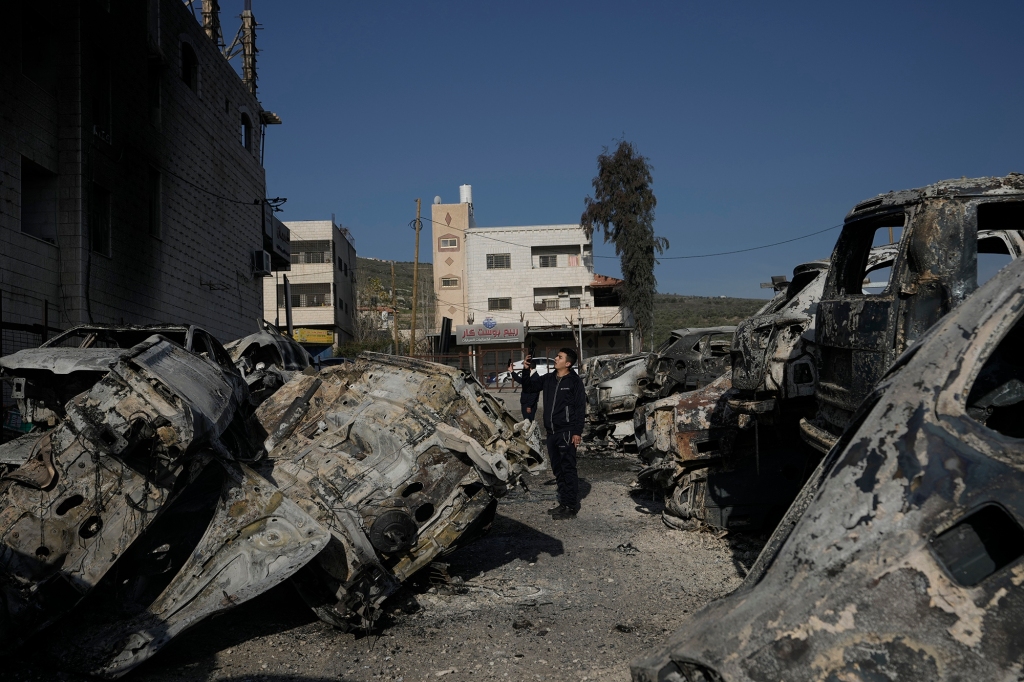 Scores of Israeli settlers went on a violent rampage in the northern West Bank, setting cars and homes on fire after two settlers were killed by a Palestinian gunman. 