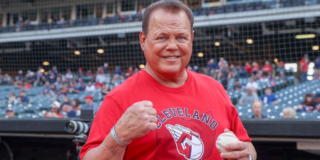 Wrestling legend and WWE announcer Jerry The King Lawler on the field prior to the Major League Baseball game between the Minnesota Twins and Cleveland Guardians on September 16, 2022, at Progressive Field in Cleveland, OH.