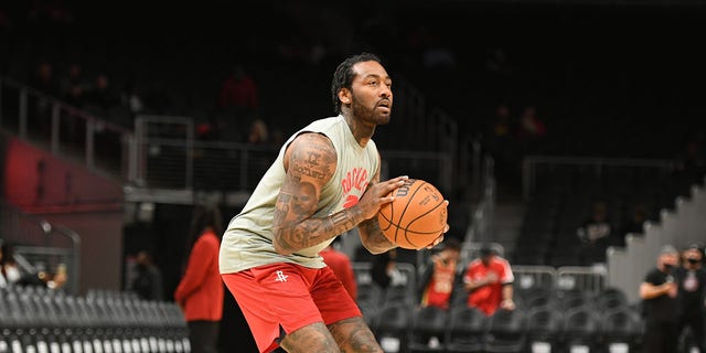 John Wall of the Houston Rockets warms up before the game against the Atlanta Hawks on Dec. 13, 2021, at State Farm Arena in Atlanta.