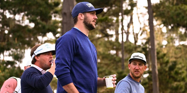 Josh Allen, foreground, walks at the eighth hole during the first round of the AT&amp;T Pebble Beach Pro-Am at Spyglass Hill Golf Course on Feb. 2, 2023, in Pebble Beach, California.