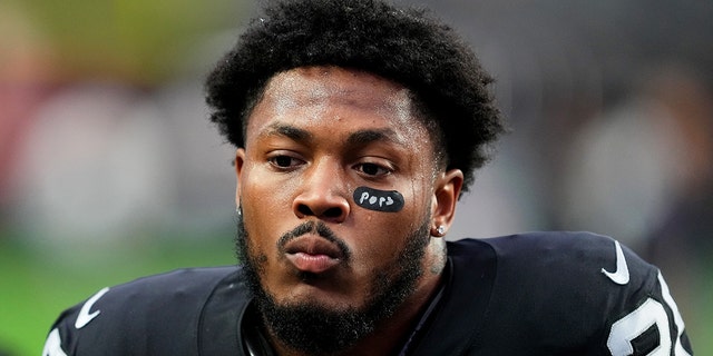 Josh Jacobs of the Raiders warms up for the Kansas City Chiefs game at Allegiant Stadium on Jan. 7, 2023, in Las Vegas.