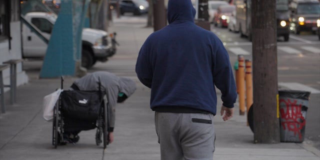 As Rodriguez approaches the man passed out from drugs, it's apparent that the addicts' wheelchair is facing downhill, pointed toward a street.