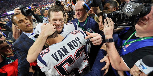 Super Bowl LIII: New England Patriots QB Tom Brady (12) victorious with Kyle Van Noy (53) after winning game vs Los Angeles Rams game at Mercedes-Benz Stadium. Atlanta, GA.