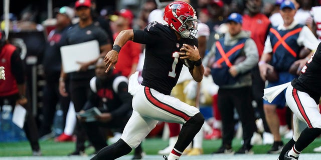 Falcons quarterback Marcus Mariota runs against the San Francisco 49ers, Oct. 16, 2022, in Atlanta.