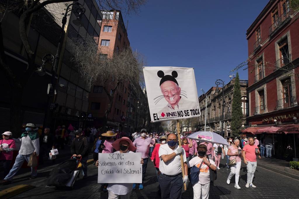  reforms pushed by President Andres Manuel Lopez Obrador to the country's electoral law that they say threaten democracy, towards Mexico City's main square, The Zocalo, Sunday, Feb. 26, 2023.