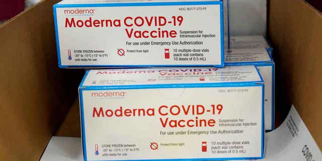 Boxes containing the Moderna COVID-19 vaccine are prepared to be shipped at the McKesson distribution center in Olive Branch, Mississippi, U.S. December 20, 2020.