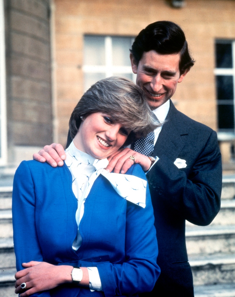 Prince Charles and Lady Diana Spencer pose for photographs following the announcement of their engagement