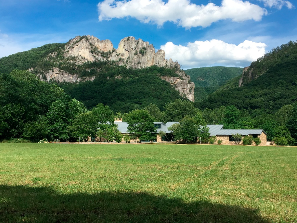 Seneca Rocks rises behind the Monongahela National Forest Discovery Center in eastern West Virginia in 2017.