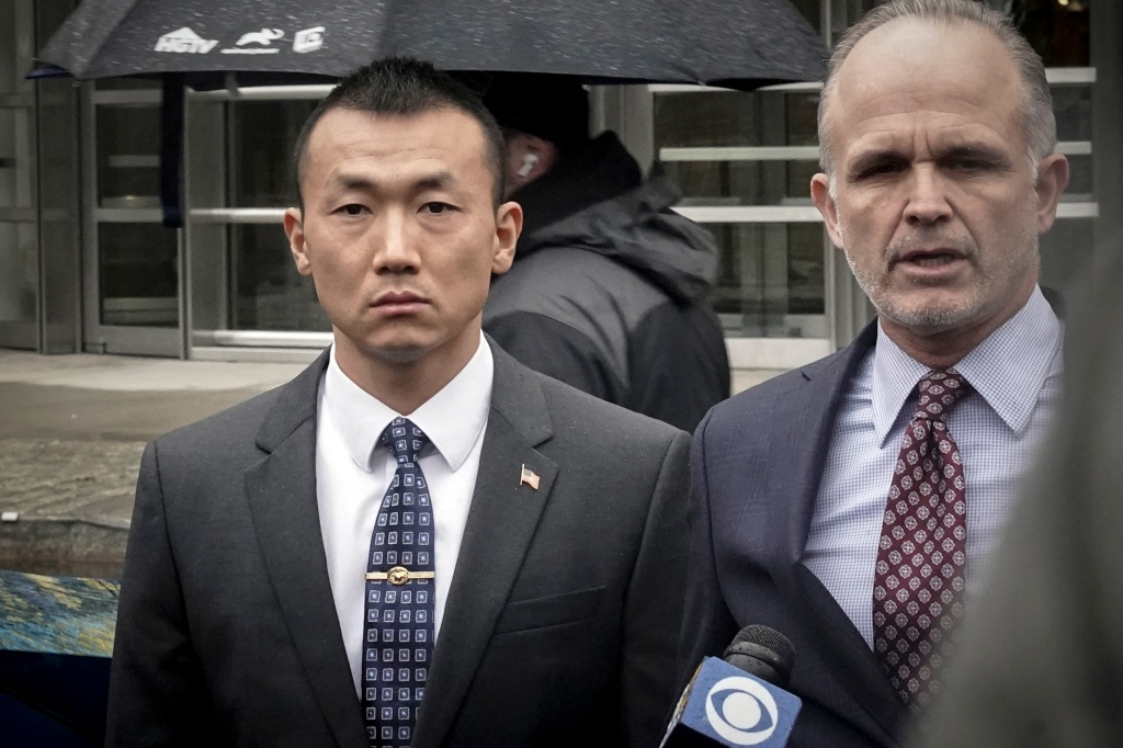 NYPD officer Baimadajie Angwang was accused of spying on Tibetan-Americans before federal prosecutors dropped the case.