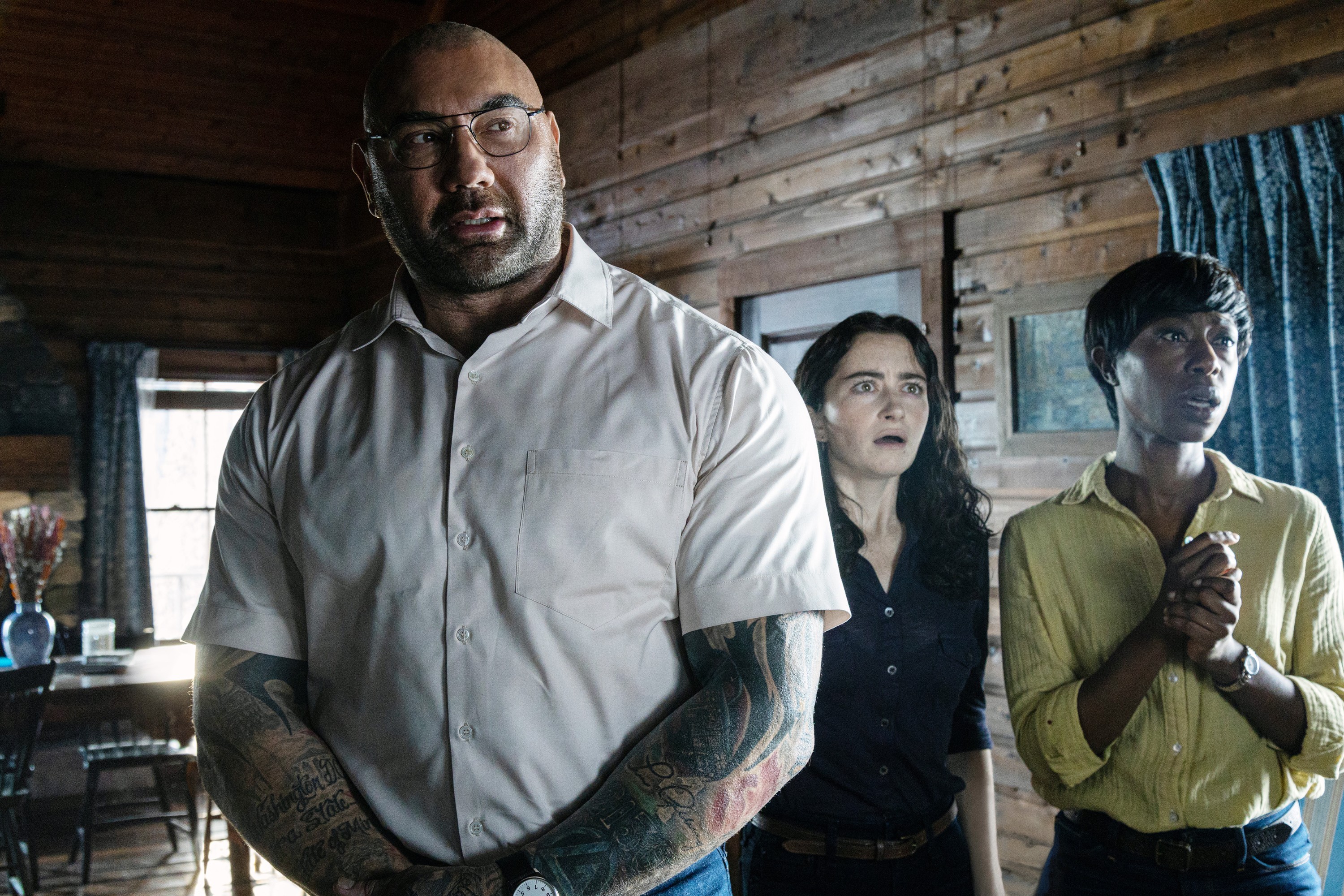 Leonard (Dave Bautista) breaks into a cabin and has horrifying news. 