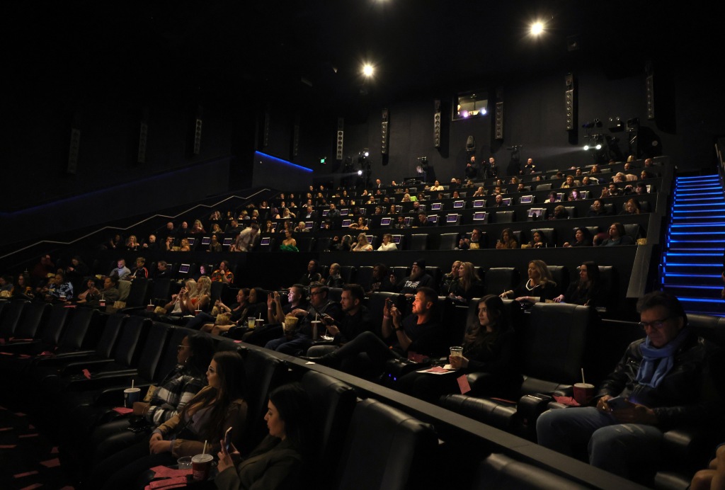 A picture of a hall at a movie theater.