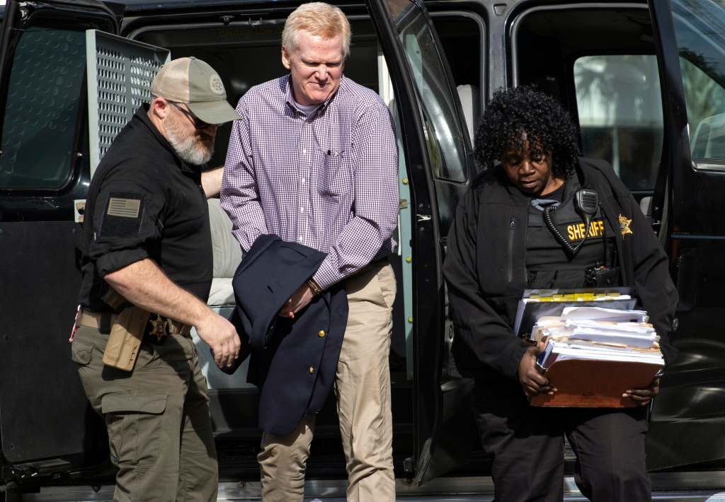 Alex Murdaugh is escorted back into the courtroom for his double murder trial at the Colleton County Courthouse.