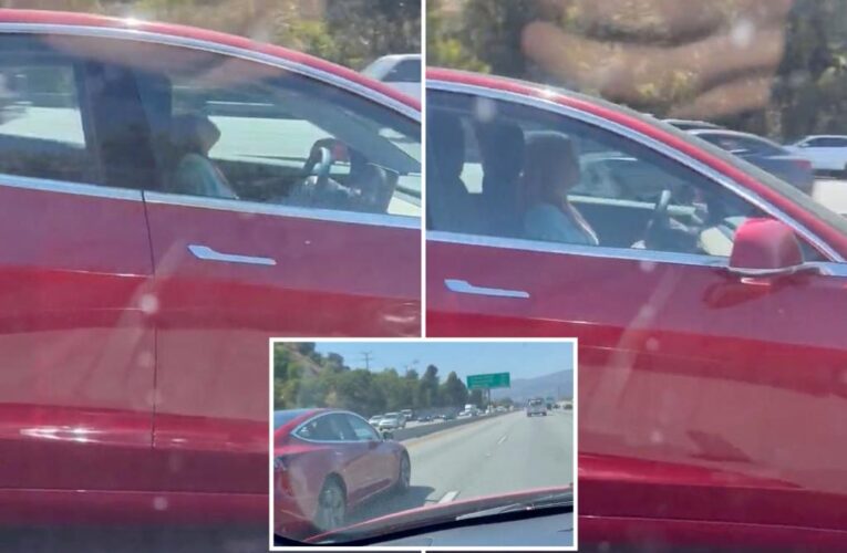 Another video shows Tesla driver sleeping behind the wheel