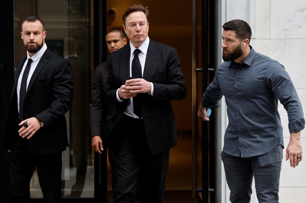 Tesla CEO Elon Musk and his security detail late last month.