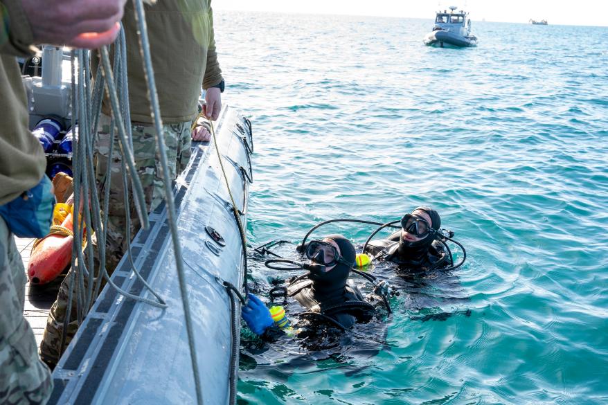 Sailors conducts a search for debris with an underwater vehicle during recovery efforts of a Chinese high-altitude balloon in the Atlantic Ocean.