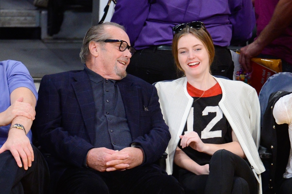 Nicholson is seen with daughter Lorraine at a Lakers game in 2014. 