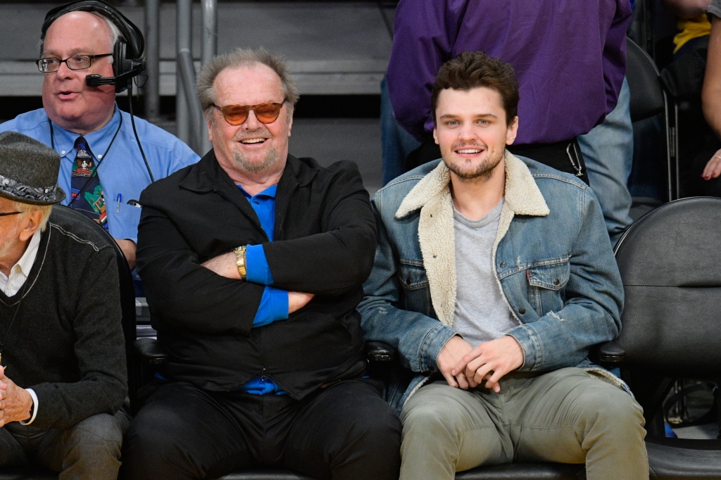 Nicholson is seen with son Ray at a Lakers game in 2016. 