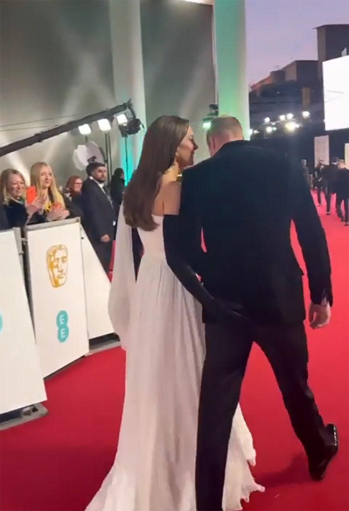 The princess was seen patting her beau on the behind as they walked the red carpet. 