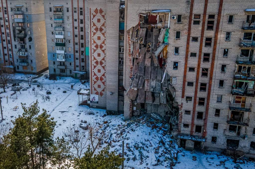 This aerial photograph shows a damaged residential building in the town of Lyman, Donetsk region, on February 22, 2023.