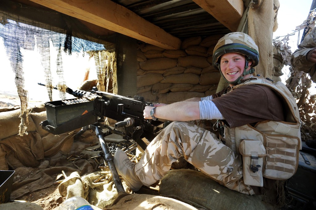 A smiling Prince Harry mans a 50mm machine gun aimed at Taliban fighters on January 2, 2008 in Helmand Province, Afghanistan