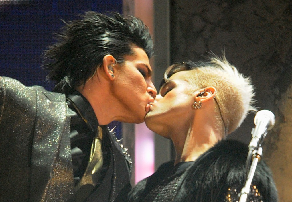 Adam Lambert kissing his male bassist at the 2009 American Music Awards.