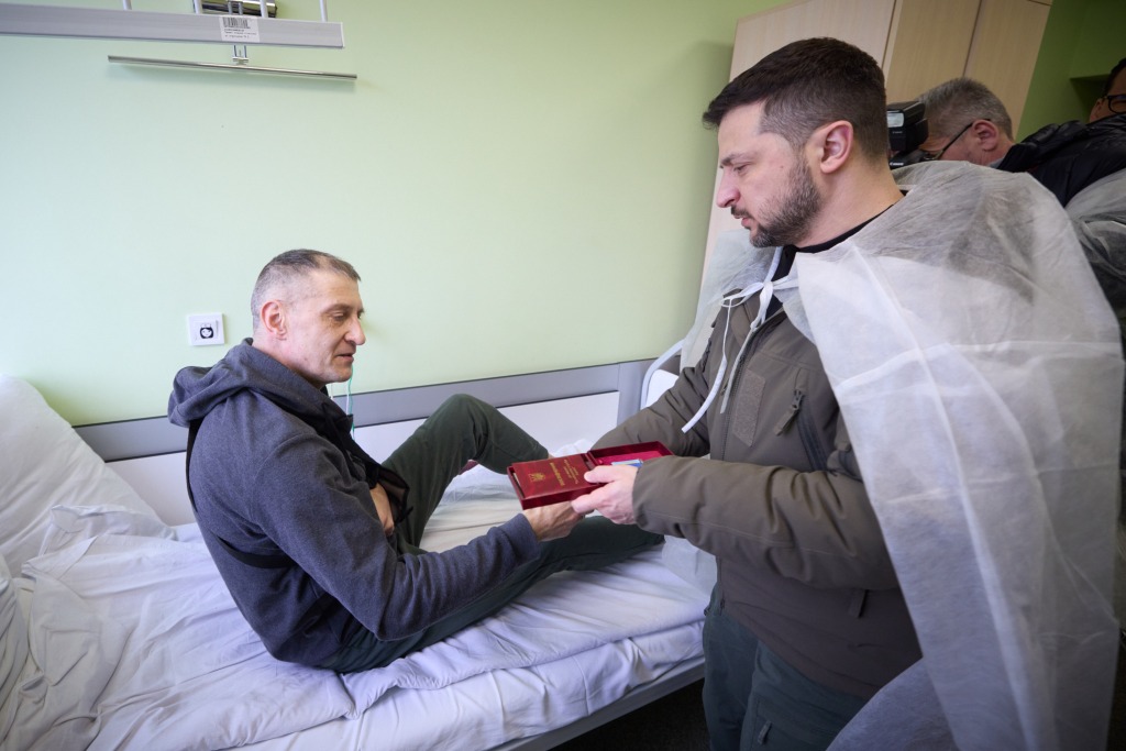 Ukrainian President Volodymyr Zelensky visits injured soldiers to hand out medals as he attended memorial service for those killed and injured since beginning of the Russia-Ukraine war on the first anniversary in Kyiv, Ukraine on February 24, 2023. 
