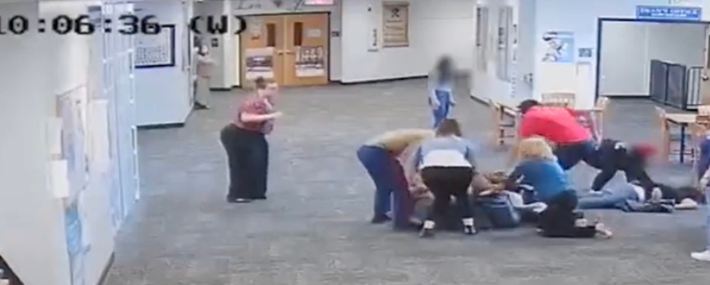 People helping woman after the attack