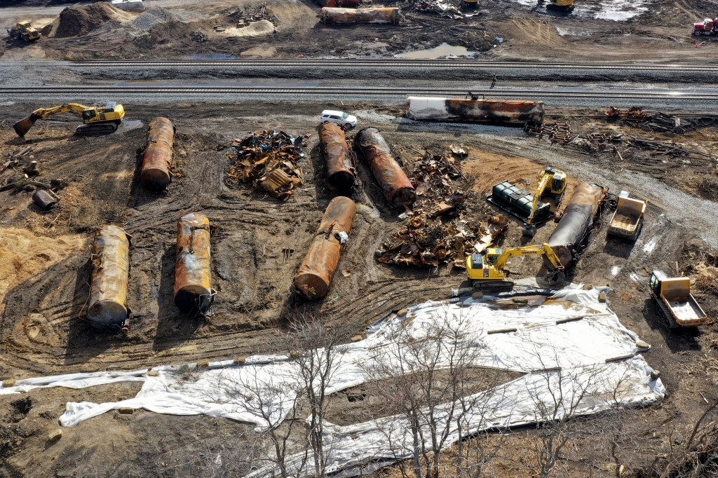 A view of the scene Friday, Feb. 24, 2023, as the cleanup continues at the site of of a Norfolk Southern freight train derailment that happened on Feb. 3