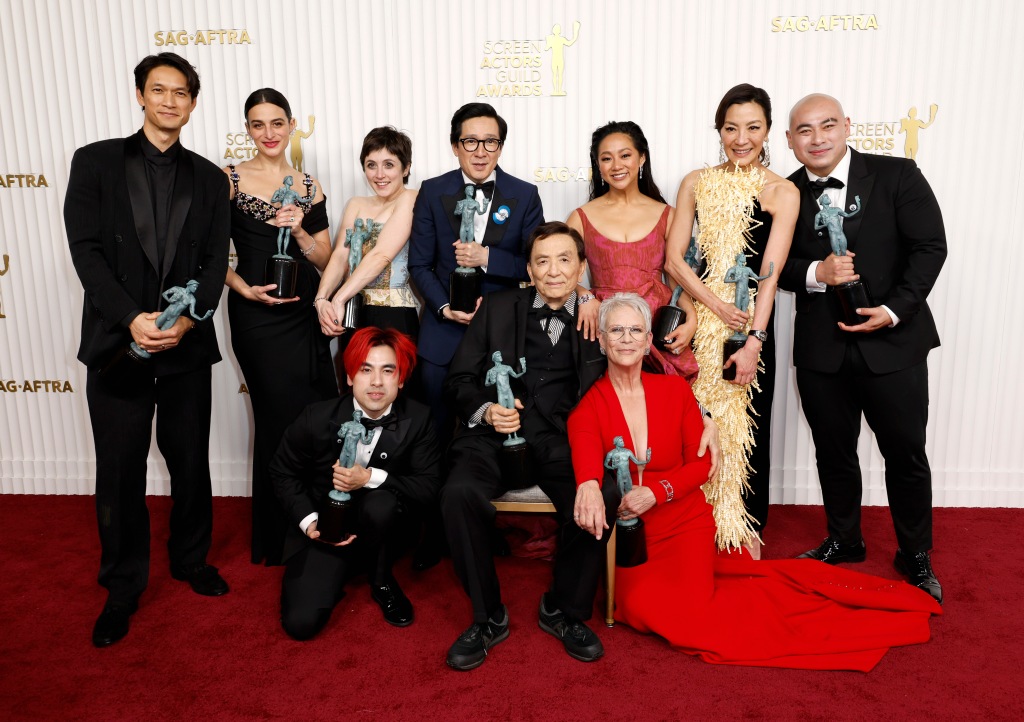 Harry Shum Jr., Jenny Slate, Andy Le, Tallie Medel, Ke Huy Quan, James Hong, Stephanie Hsu, Jamie Lee Curtis, Michelle Yeoh and Brian Le, recipients of the Outstanding Performance by a Cast in a Motion Picture award for "Everything Everywhere All at Once ,"