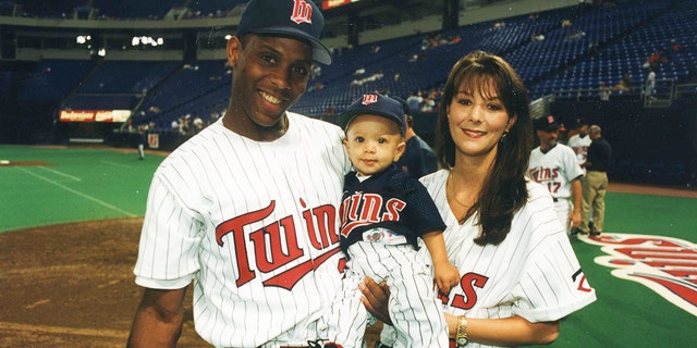 Pat Mahomes poses with his wife and young son, Patrick.