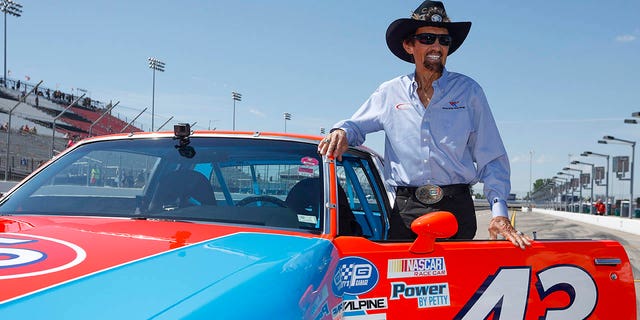 NASCAR Hall of Famer Richard Petty prepares to drive a replica of his #43 STP Pontiac at WWT Raceway on June 3, 2022, in Madison, Illinois.